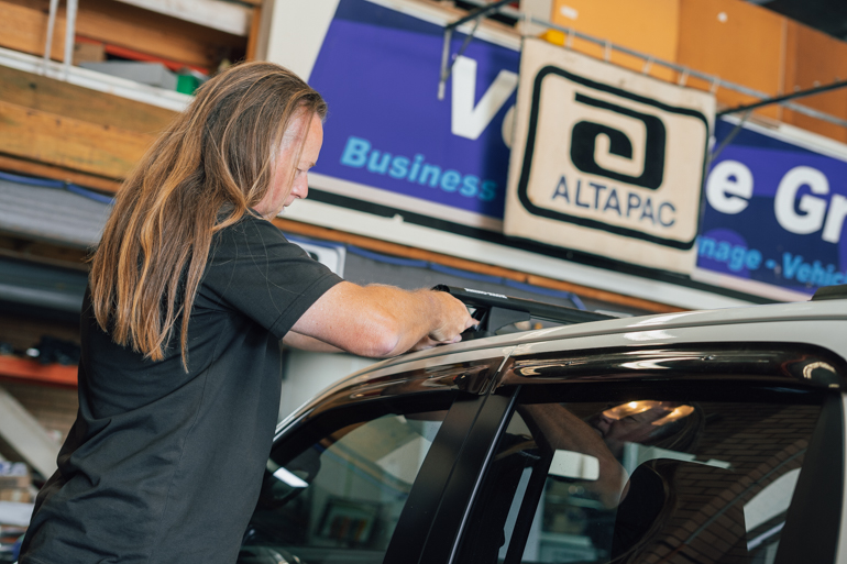 Altapac technician fitting accessories in the workshop