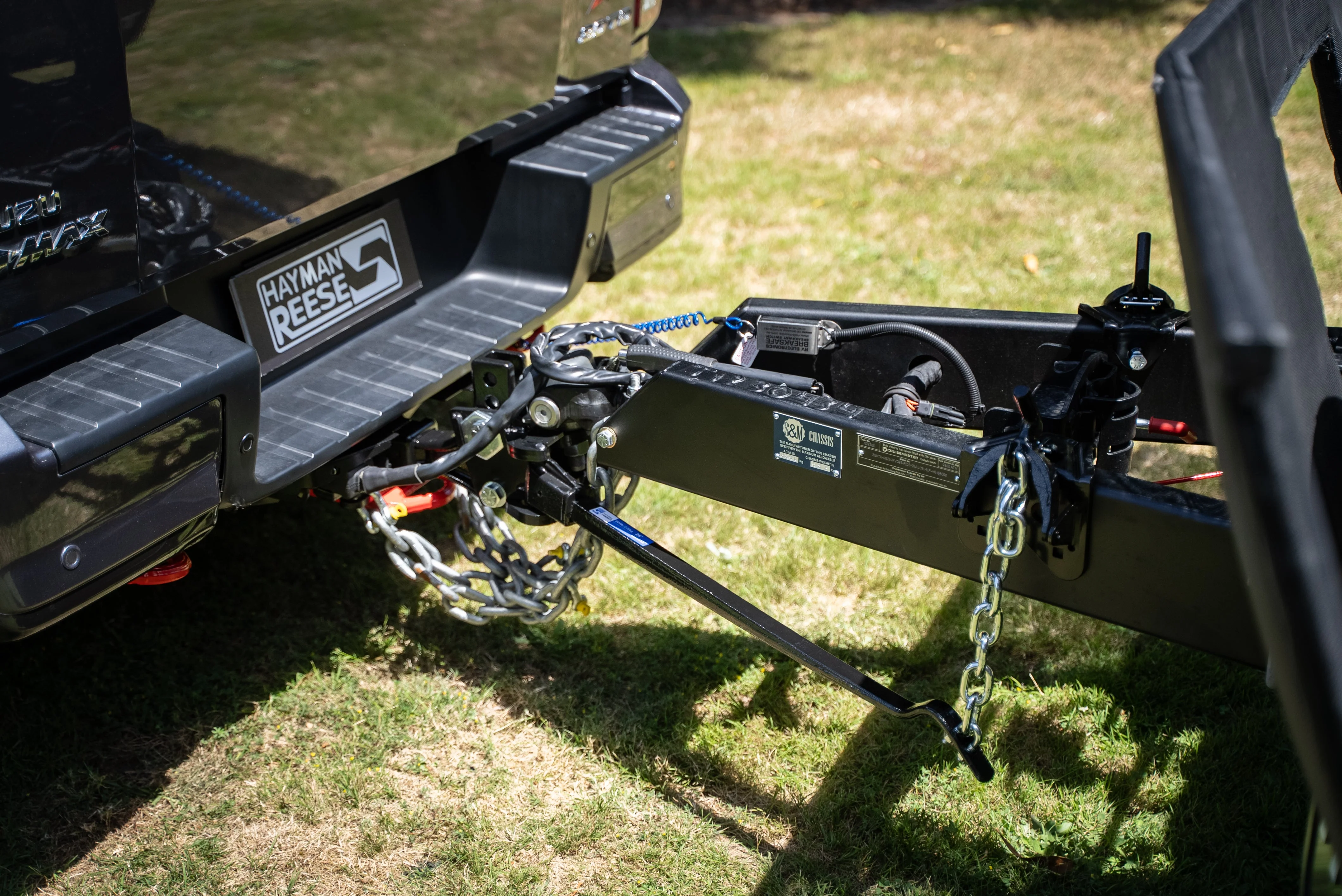 Heavy duty towbar fitted to a dual cab ute towing a caravan